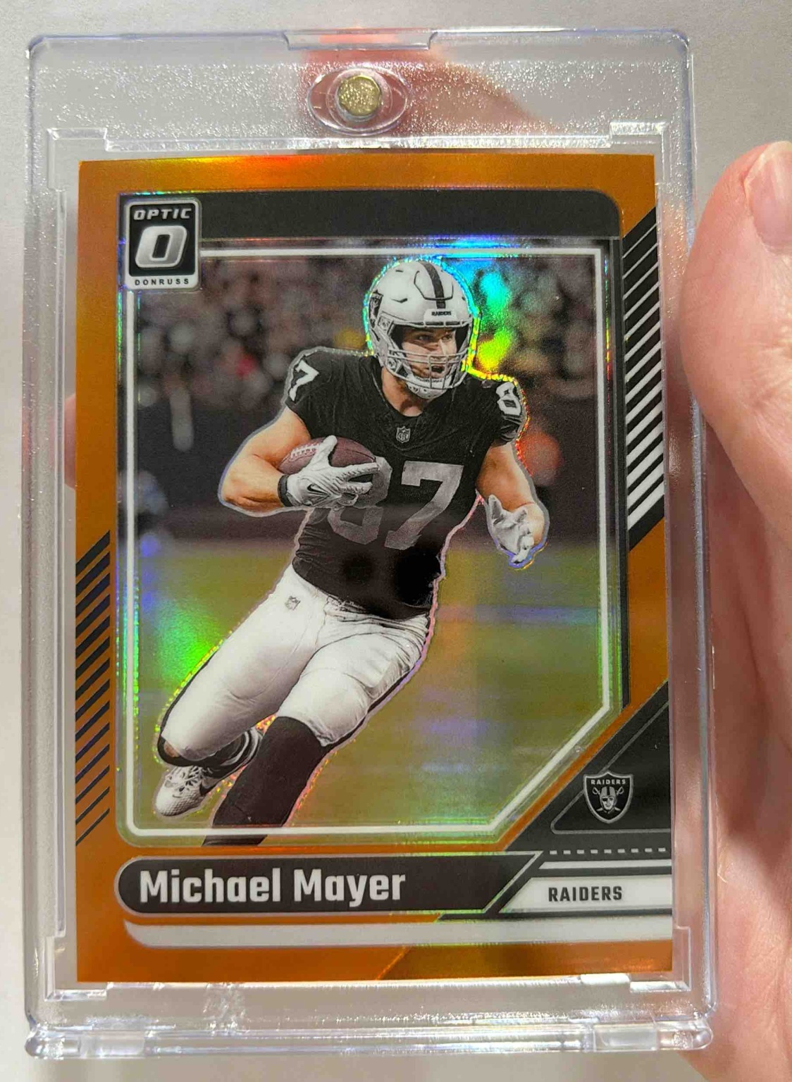 Card image for 2024 Panini Donruss Optic Michael Mayer Orange /249 #103 Raiders