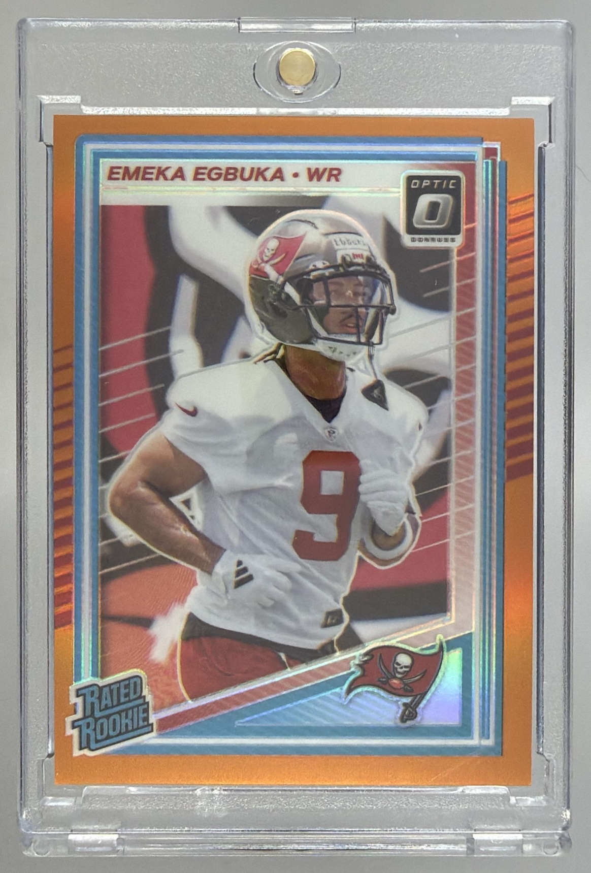 Card image for 2025 Panini Donruss Optic Emeka Egbuka Rated Rookie Orange Prizm /299 #265 Buccaneers