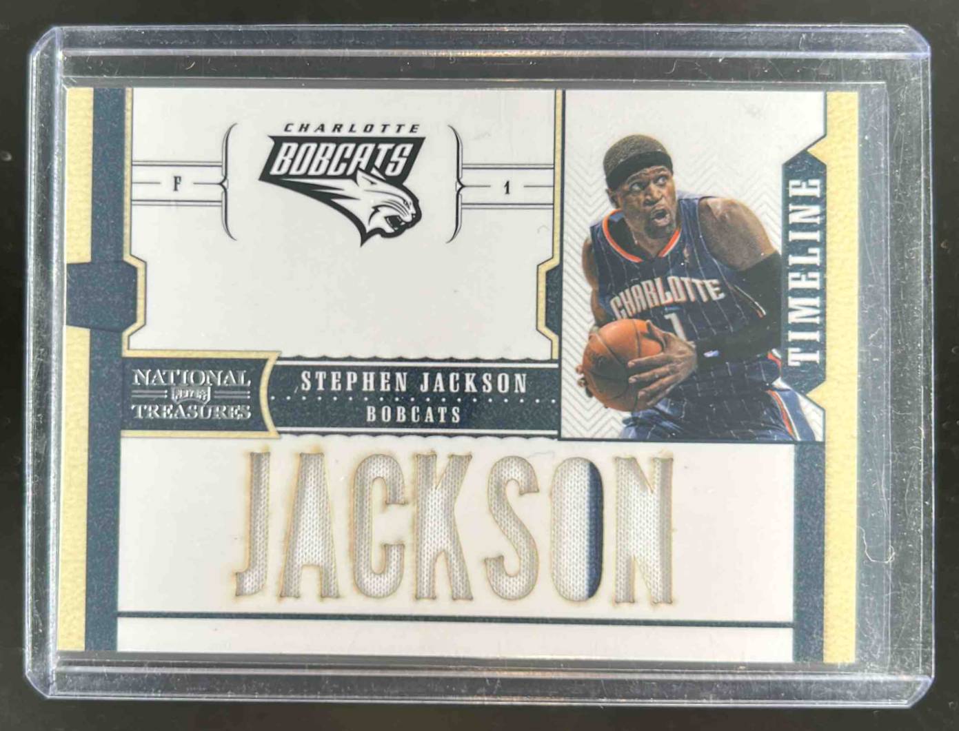 Card image for 2010 Playoff National Treasures Stephen Jackson Timeline Materials Custom Names /99 #3 MEM