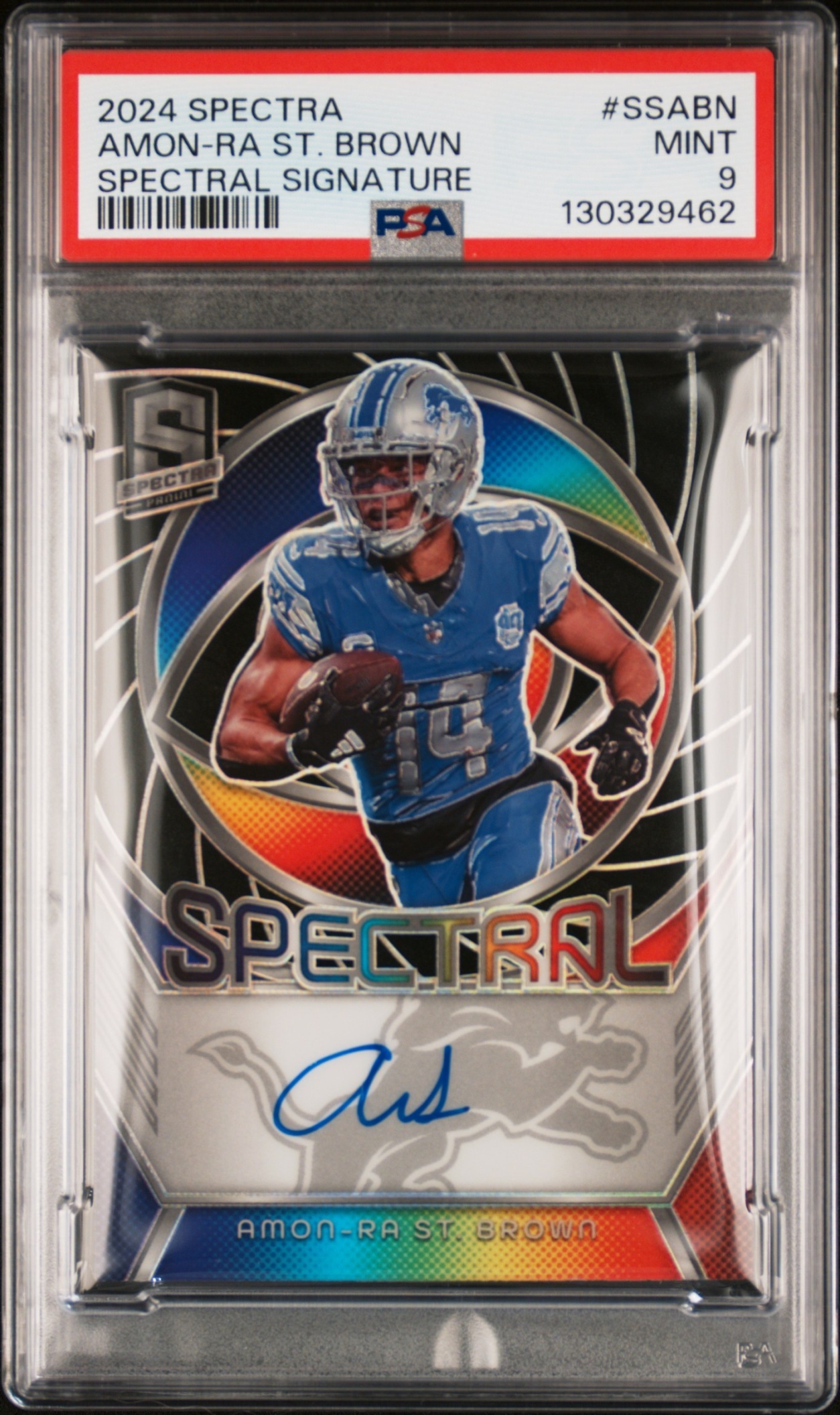 Card image for 2024 Panini Spectra Amon-Ra St. Brown Spectral Signatures /49 #SS-ABN Auto Lions PSA 9