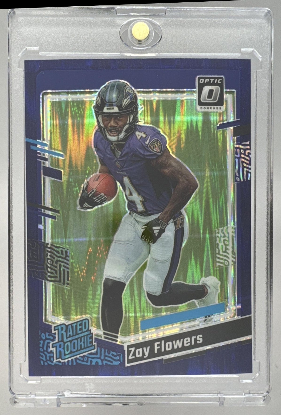 Card image for 2023 Panini Donruss Optic Zay Flowers Green Velocity Prizm #210 RC Rated Rookie Ravens