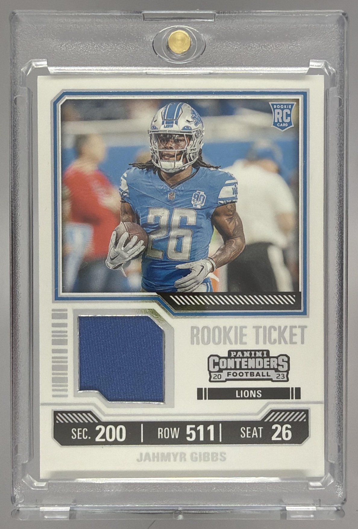 Card image for 2023 Panini Contenders Jahmyr Gibbs Rookie Ticket Swatches #TS12 MEM RC Lions