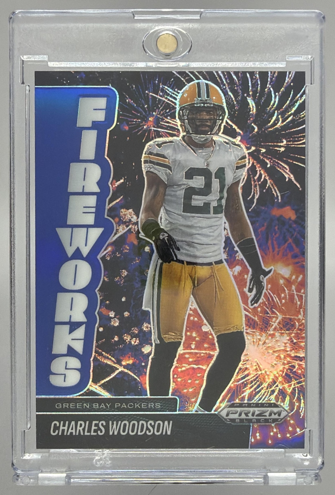 Card image for 2025 Panini Prizm Black Charles Woodson Fireworks Blue /199 #21 Packers