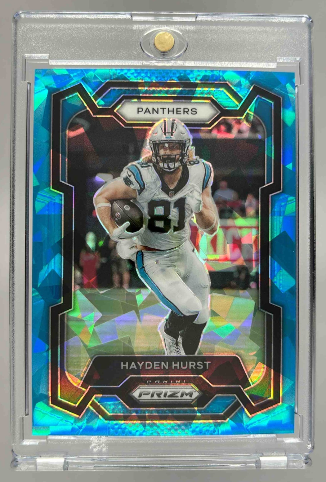 Card image for 2023 Panini Football Prizm Hayden Hurst Blue Ice /99 #42 Carolina Panthers