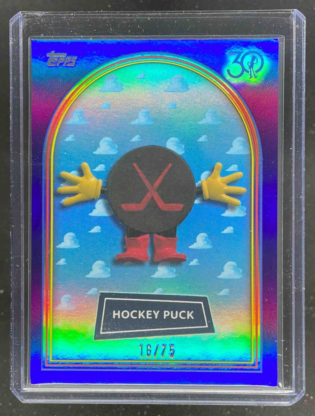Card image for Hockey Puck 2025 Topps 30 Years of Toy Story Purple Foil /75 #11