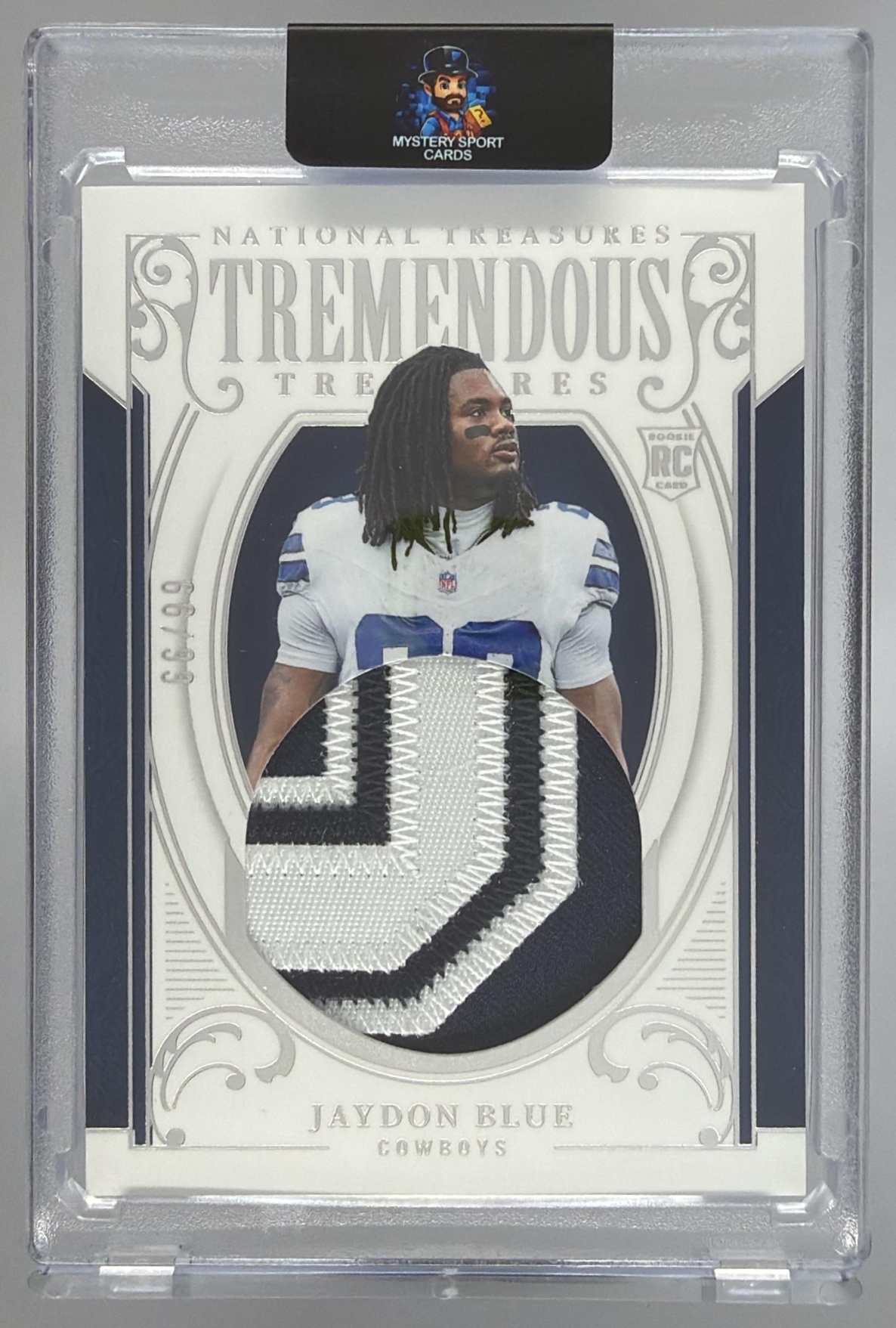 Card image for 2025 Panini National Treasures Jaydon Blue Tremendous /99 #TT-JBE MEM RC Cowboys
