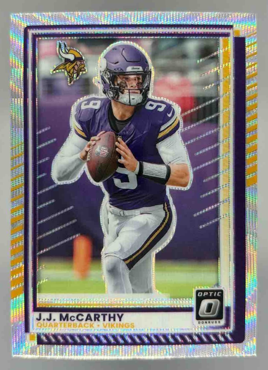Card image for 2025 Panini Donruss Optic J.J. McCarthy Wave Prizm /300 #46 Vikings