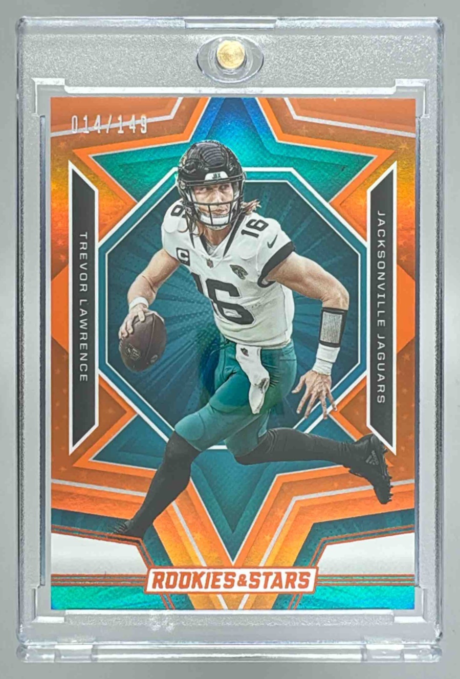 Card image for 2023 Panini Rookies & Stars Trevor Lawrence Orange /149 #46 Jaguars