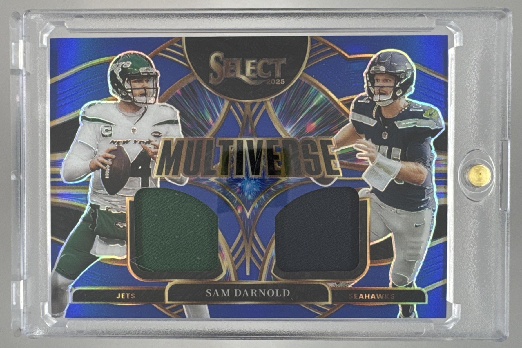 Card image for 2025 Panini Football Select Sam Darnold Multiverse Jerseys Blue Prizm #MVJ-SDD