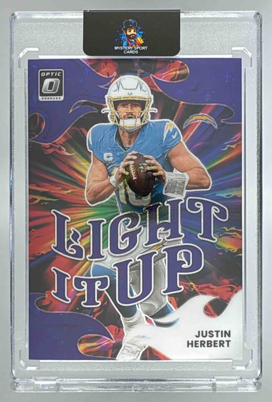 Card image for 2025 Panini Donruss Optic Justin Herbert Light It Up Purple Stars Prizm /25 #12 Chargers