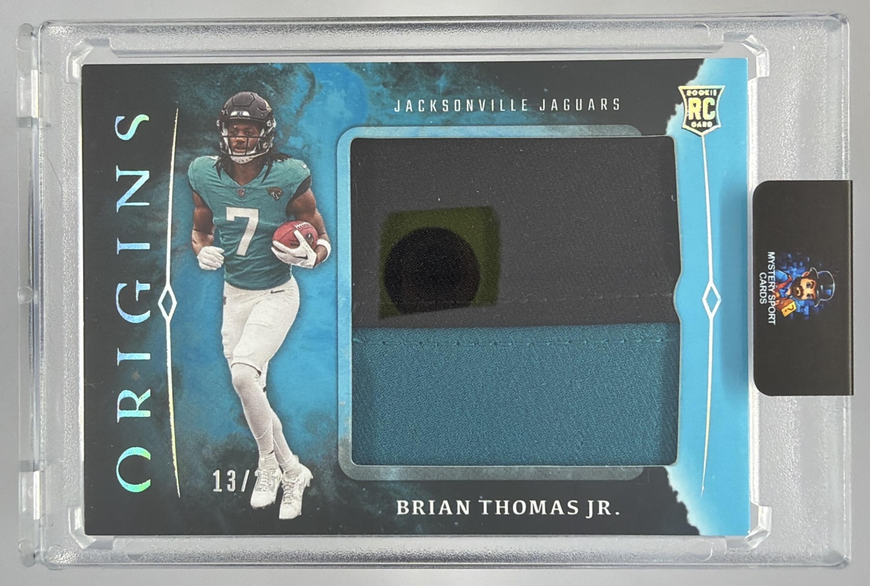 Card image for 2024 Panini Origins Brian Thomas Jr. Rookie Jumbo Jerseys Turquoise /25 #RJJ-BTH RC Jaguars