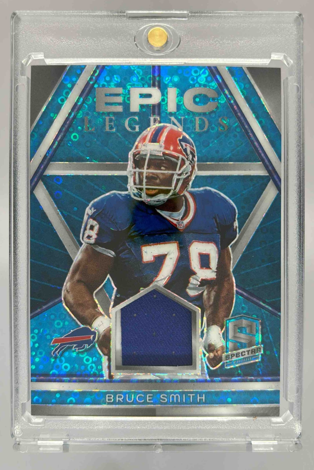 Card image for 2024 Panini Spectra Bruce Smith Epic Legends Materials Blue Neon /60 #ELM-BSH MEM Bills