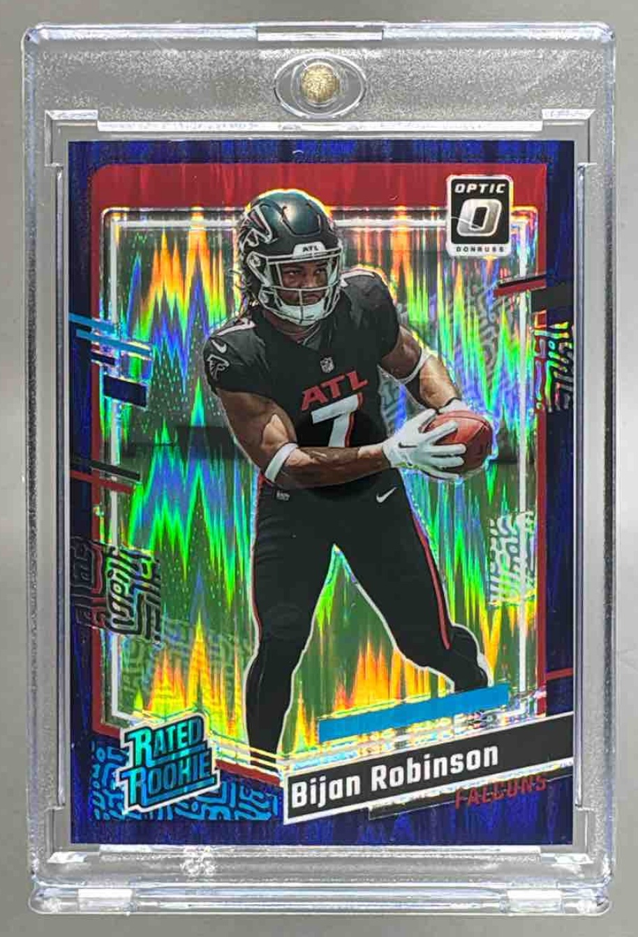 Card image for 2023 Panini Donruss Optic Bijan Robinson Purple Shock Prizm #206 RC Rated Rookie Falcons