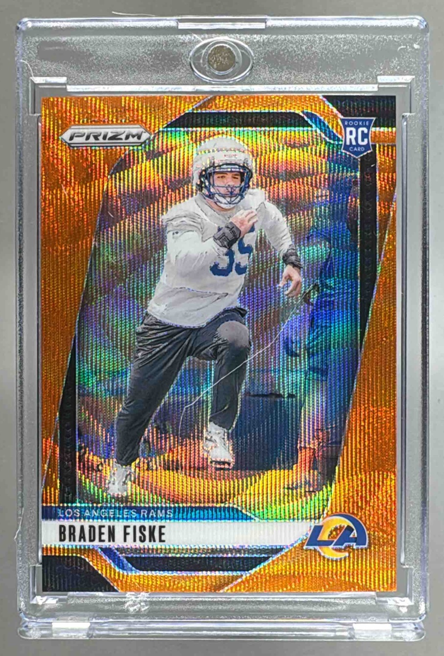 Card image for 2024 Panini Football Prizm Braden Fiske Orange Wave /60 #310 RC Los Angeles Rams