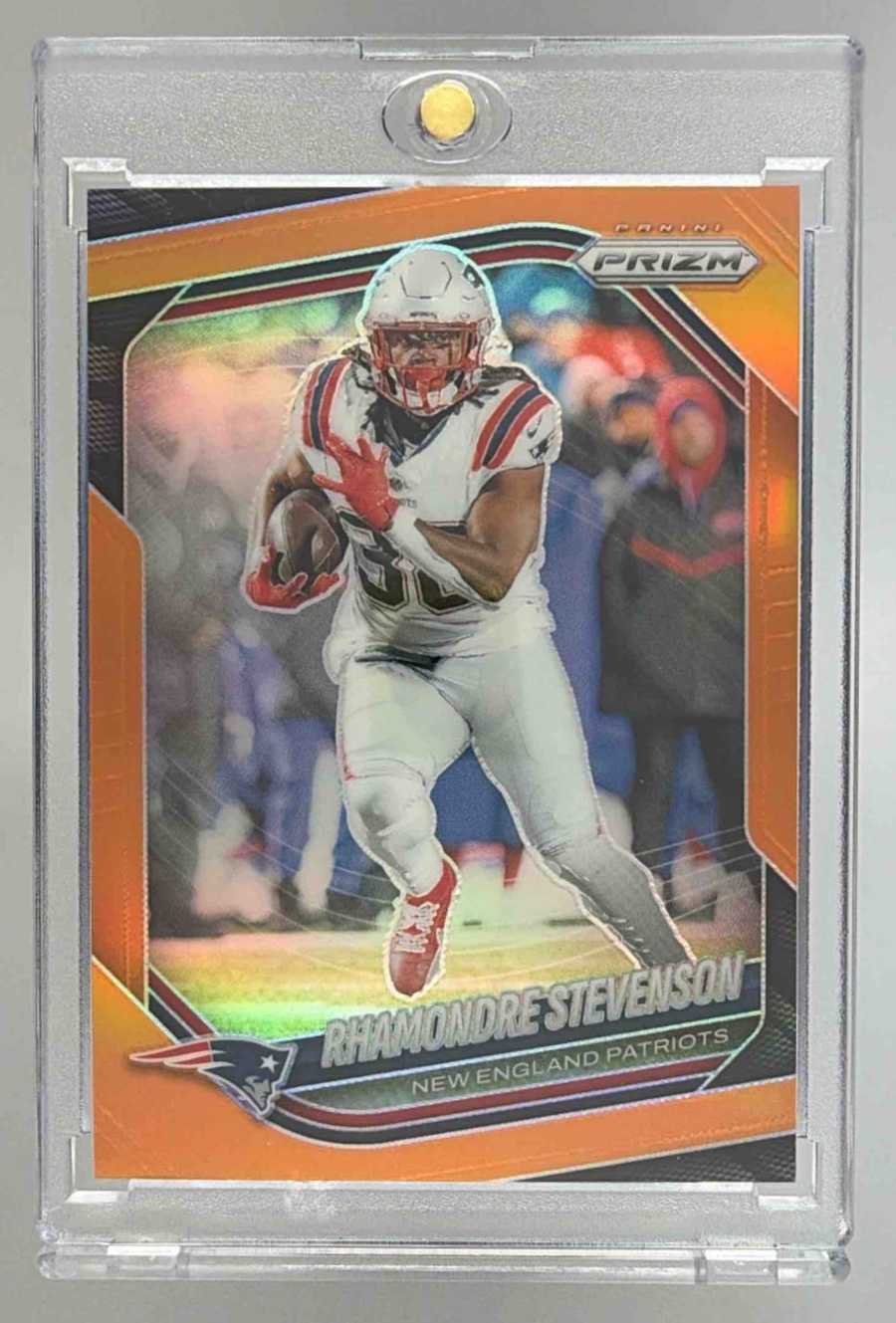 Card image for 2025 Panini Prizm Rhamondre Stevenson Orange /249 #84 Patriots