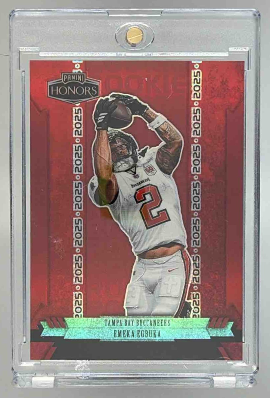 Card image for 2025 Panini Honors Emeka Egbuka Rookies Red /35 #60 RC Buccaneers