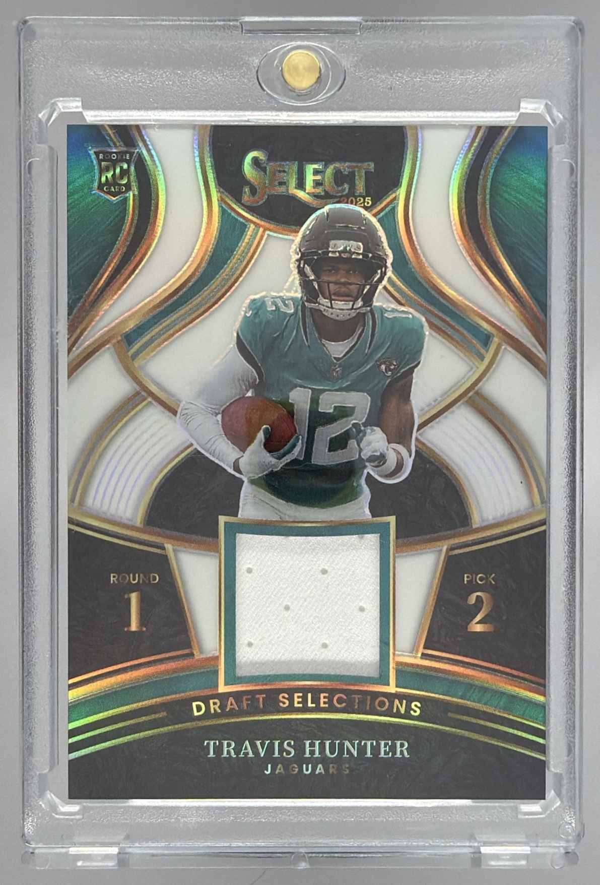 Card image for 2025 Panini Select Travis Hunter Draft Selections Memorabilia White Prizm /99 #DSM-THR MEM RC Jaguars