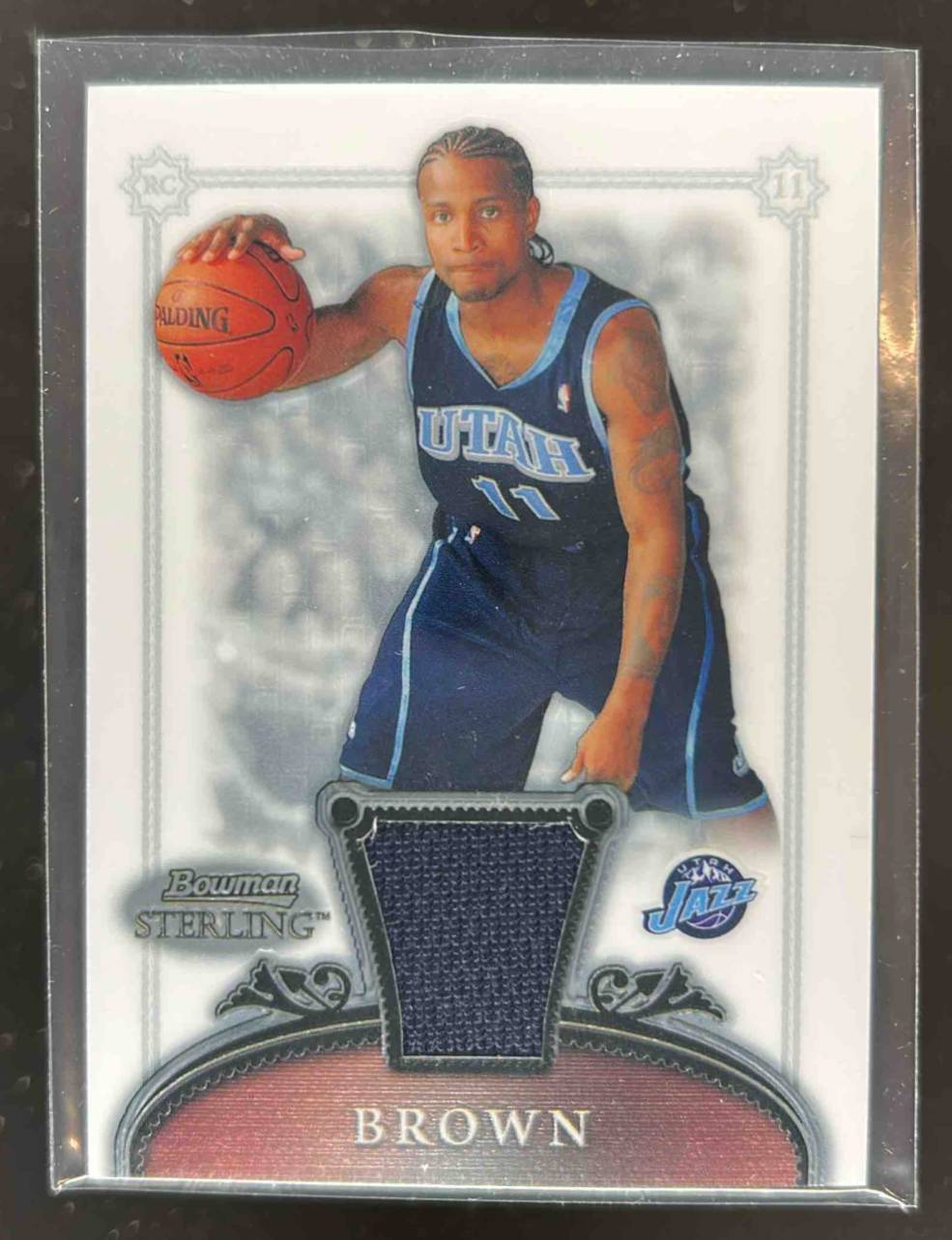 Card image for 2006-07 BOWMAN STERLING DEE BROWN #67 MEM RC ROOKIE UTAH JAZZ