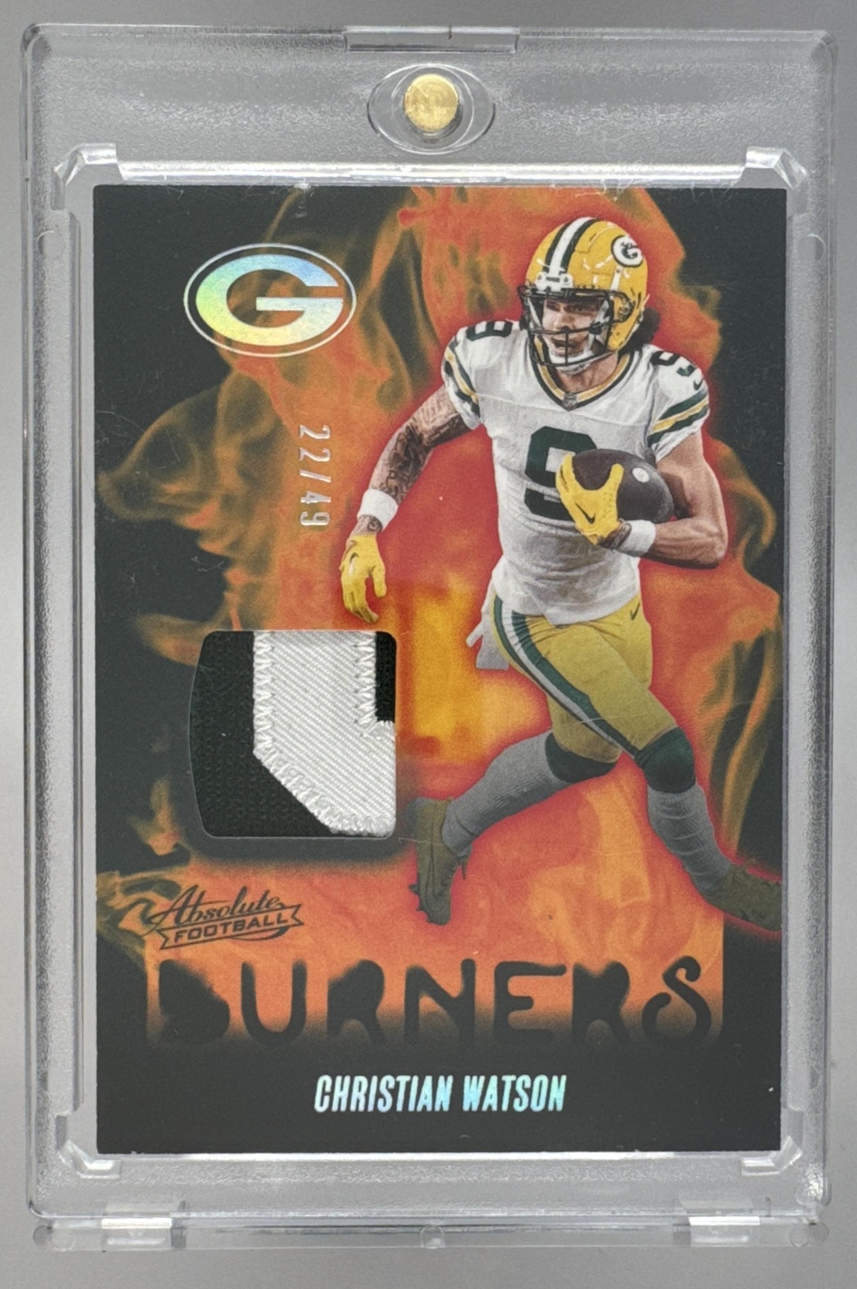 Card image for 2024 Panini Absolute Christian Watson Burners Holo Silver /49 #AB-CWN MEM Packers