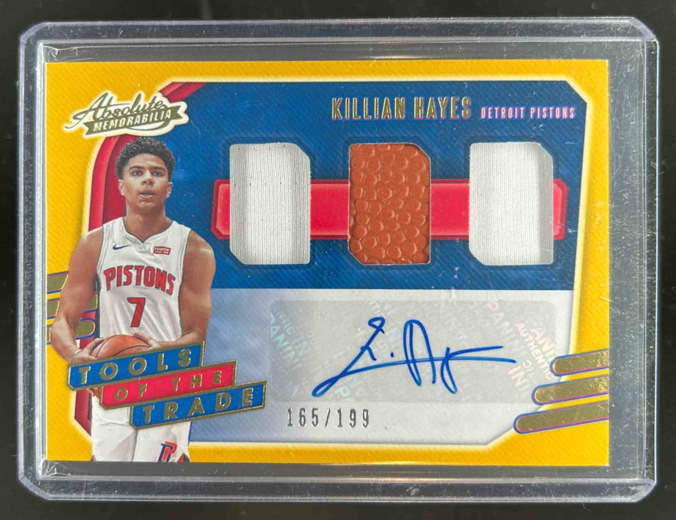 Card image for 2020-21 ABSOLUTE MEMORABILIA KILLIAN HAYES #TT3-KHA TOOLS OF THE TRADE THREE SWATCH SIGNATURES LEVEL 1 /199 RC AUTO