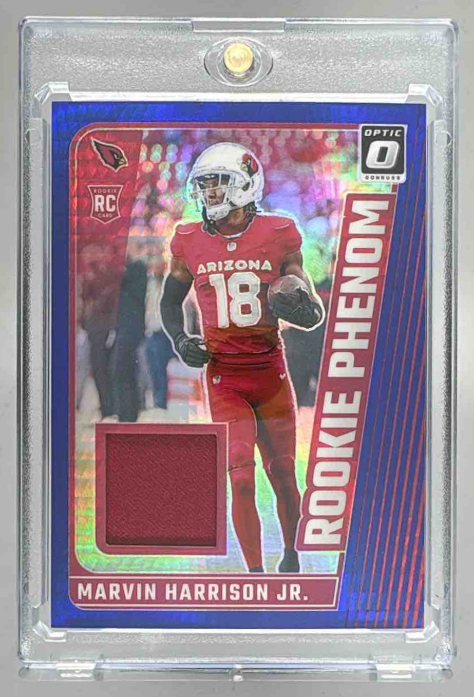 Card image for 2024 Panini Donruss Optic Marvin Harrison Jr. Rookie Phenoms Blue Hyper #RPB-MHJ MEM RC Cardinals