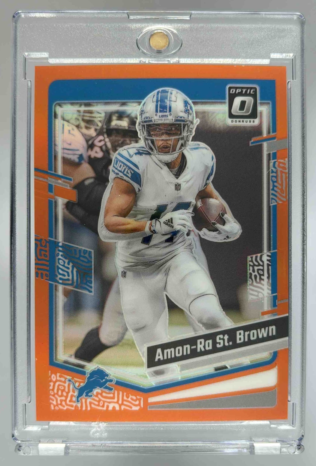 Card image for 2023 Panini Donruss Optic Amon-Ra St. Brown Orange Prizm /249 #59 Lions