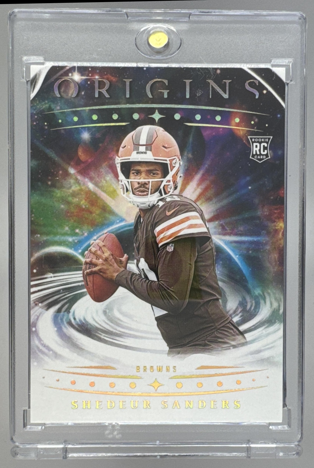 Card image for 2025 Panini Football Origins Shedeur Sanders Rookie #107 RC Cleveland Browns