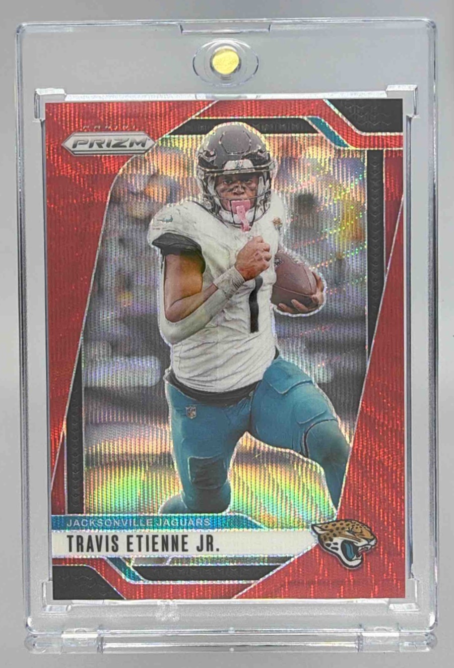 Card image for 2024 Panini Prizm Travis Etienne Jr. Red Wave /149 #130 Jaguars