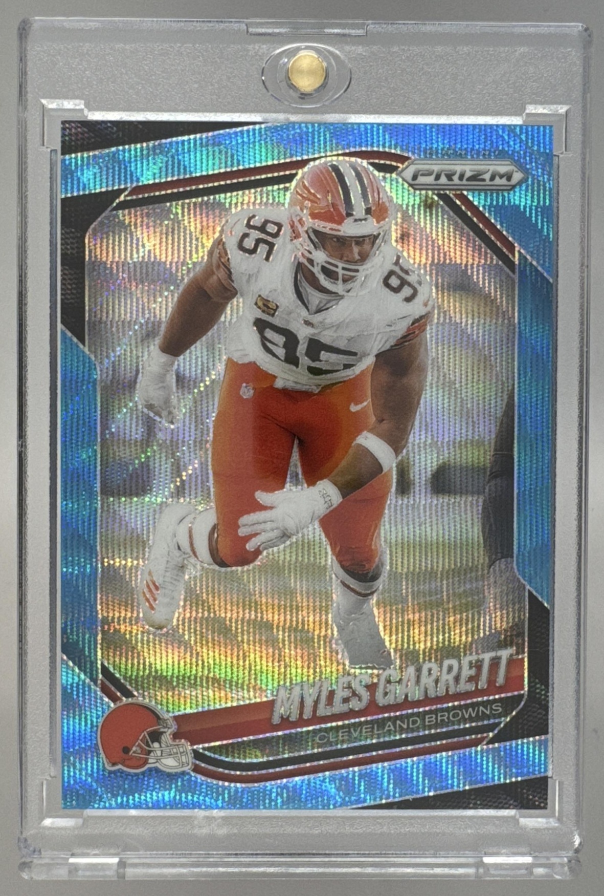 Card image for 2025 Panini Football Prizm Myles Garrett Blue Wave /230 #73 Cleveland Browns