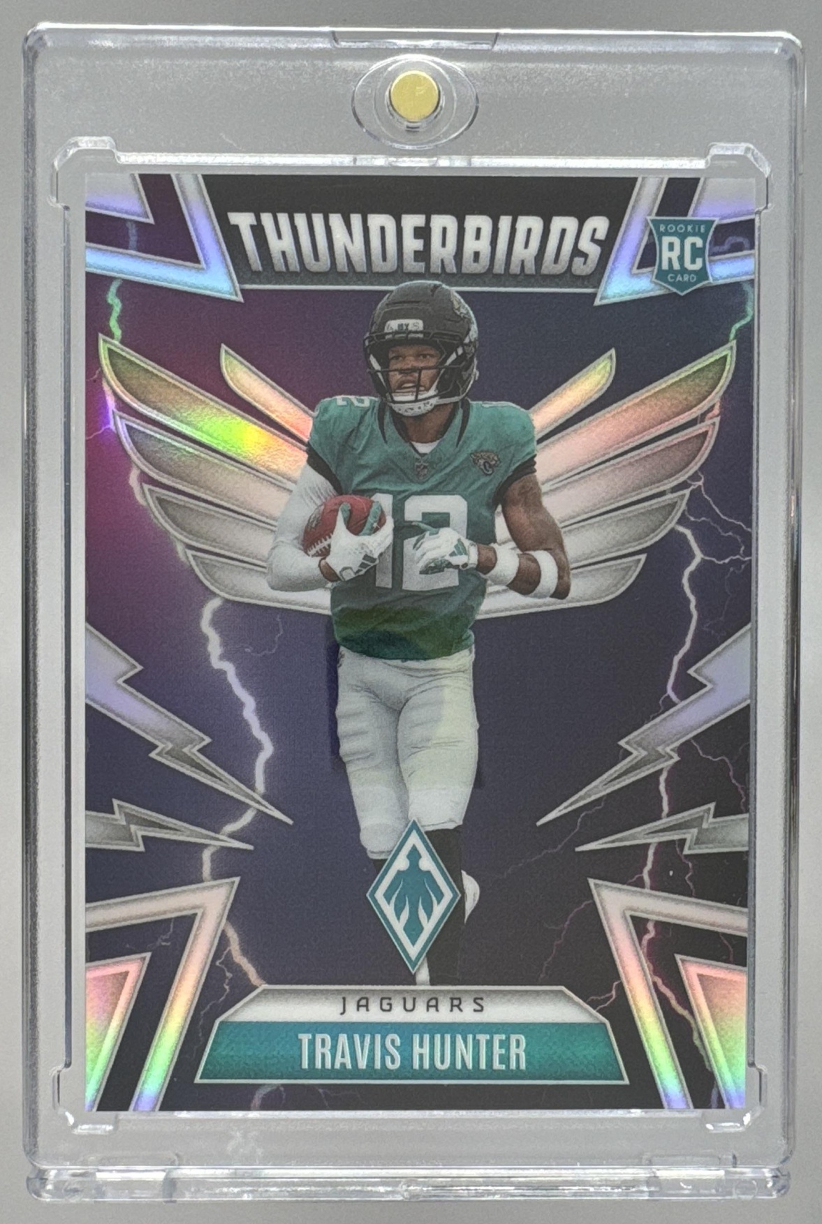 Card image for 2025 Panini Phoenix Travis Hunter Thunderbirds #22 RC Jaguars