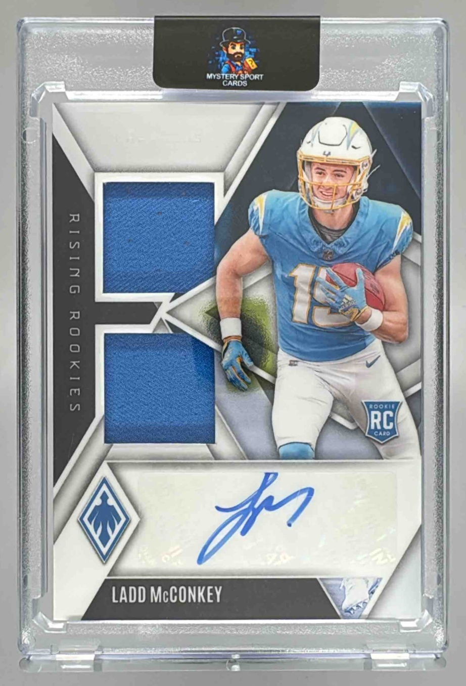 Card image for 2024 Panini Phoenix Ladd McConkey Rising Rookie Dual Patch Auto /149 #RRDP-LMY MEM RC Chargers