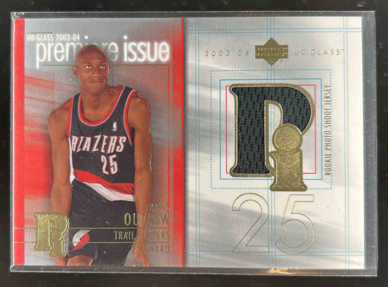 Card image for 2003-04 Upper Deck Glass Travis Outlaw Premier Issue Jerseys #PI-TO MEM