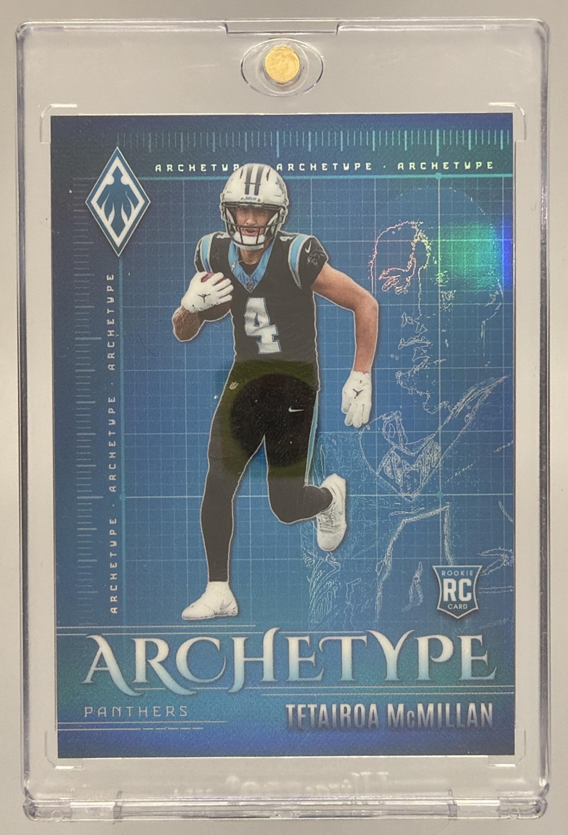 Card image for 2025 Panini Football Phoenix Tetairoa McMillan Archetype #4 Carolina Panthers