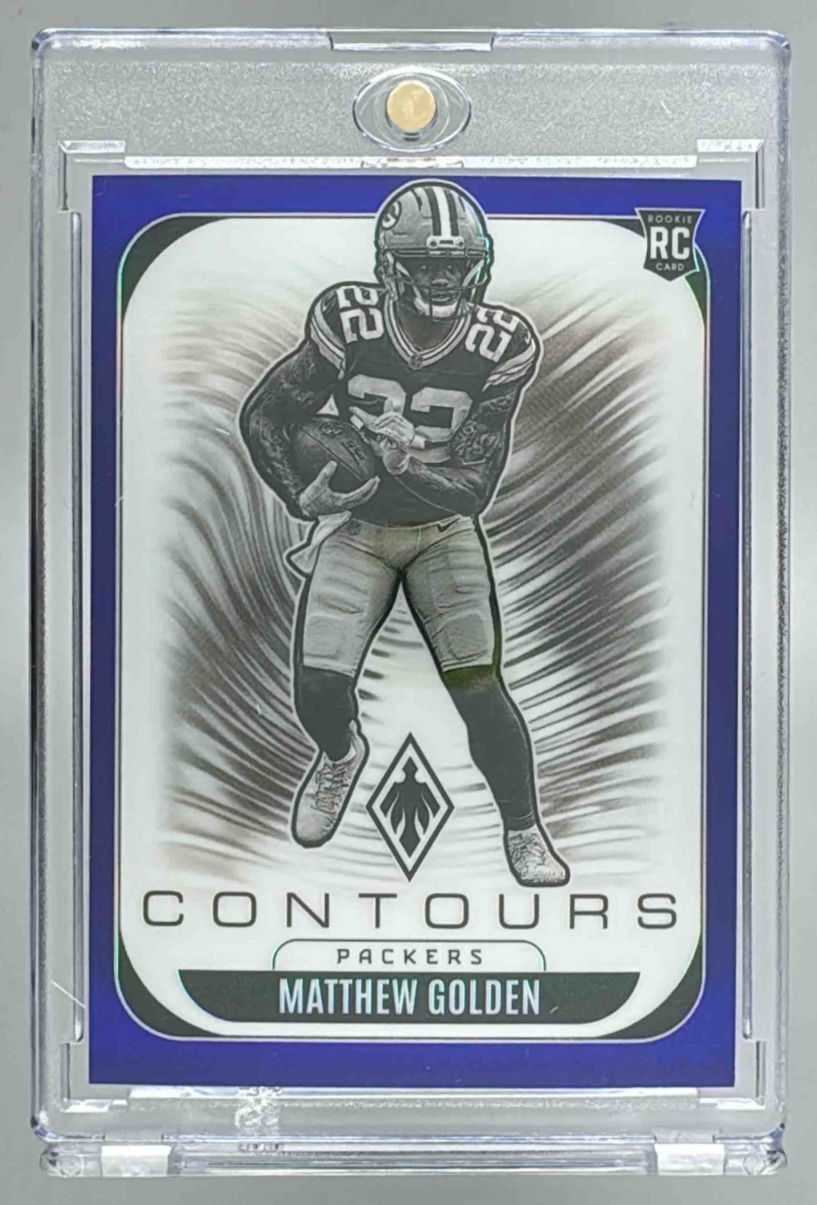 Card image for 2025 Panini Phoenix Matthew Golden Contours Blue /199 #12 RC Packers