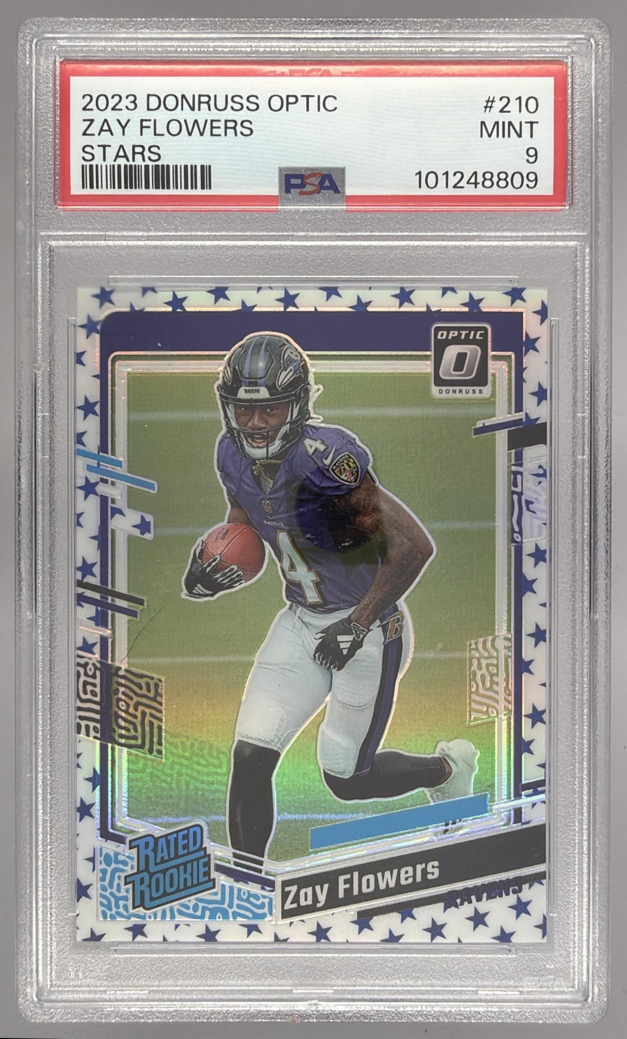 Card image for 2023 Panini Donruss Optic Zay Flowers Blue Stars Prizm #210 RC Rated Rookie Ravens