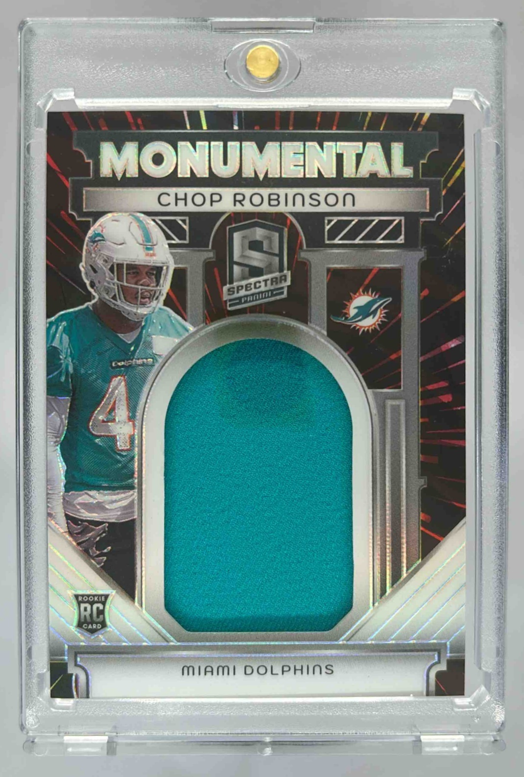 Card image for 2024 Panini Spectra Chop Robinson Monumental Memorabilia Blue Neon /50 #MM-CRN RC Dolphins