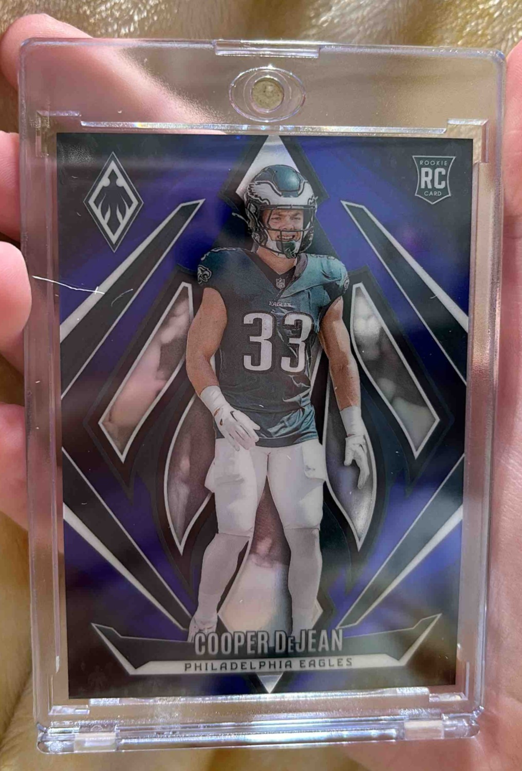 Card image for 2024 Panini Phoenix Cooper DeJean Blue Fade /249 #171 RC Eagles