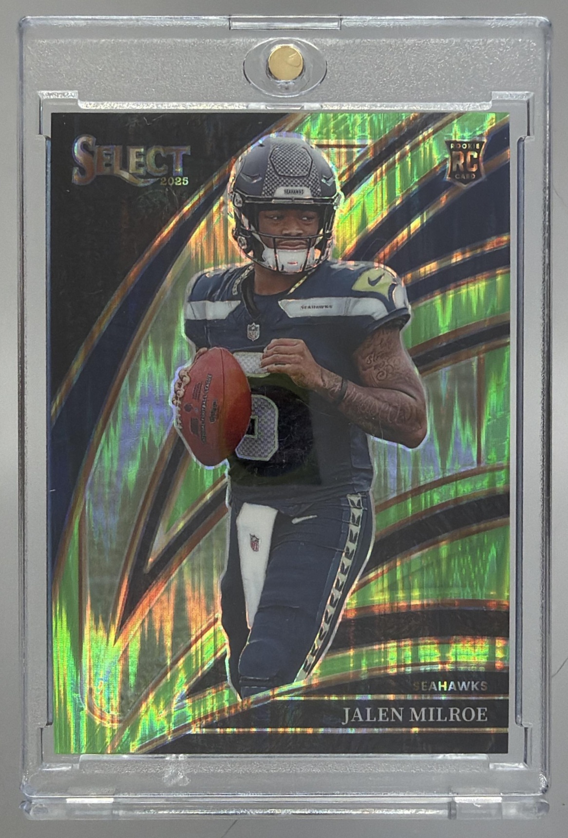 Card image for 2025 Panini Select Jalen Milroe Club Level Neon Green Prizm Shock /699 #214 RC Seahawks