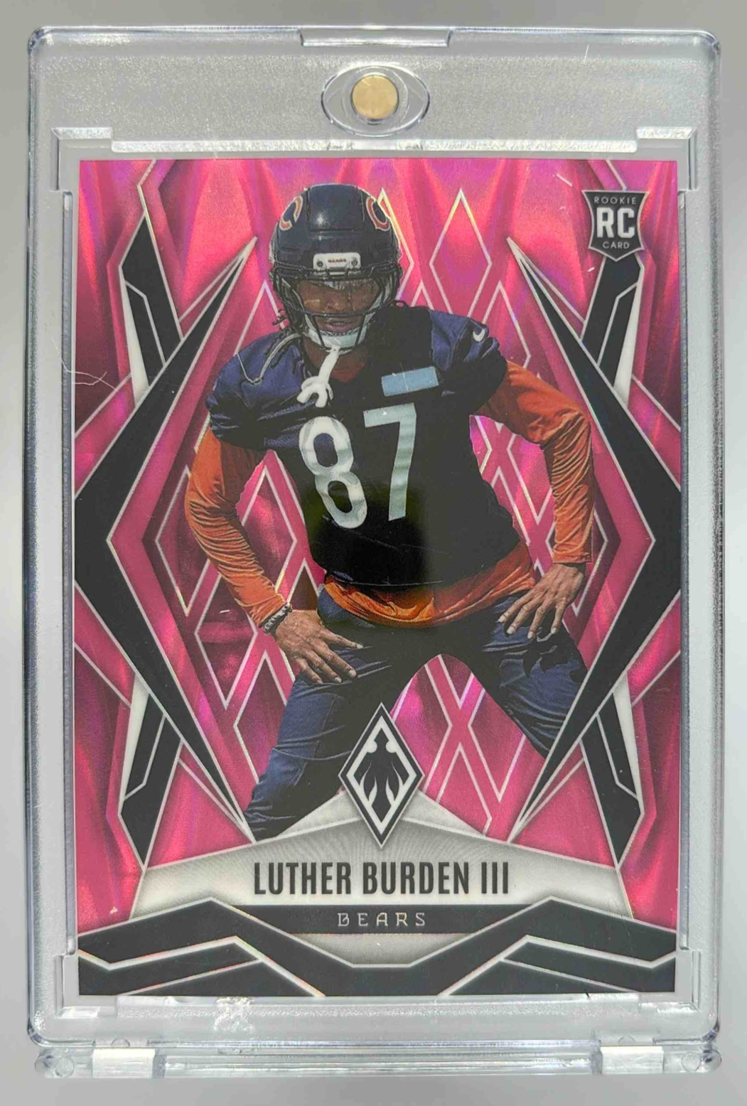 Card image for 2025 Panini Phoenix Luther Burden III Pink Seismic /75 #196 RC Bears