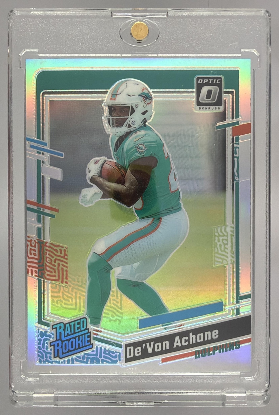 Card image for 2023 Panini Donruss Optic De'Von Achane Blue Hyper Prizm #269 RC Rated Rookie Dolphins