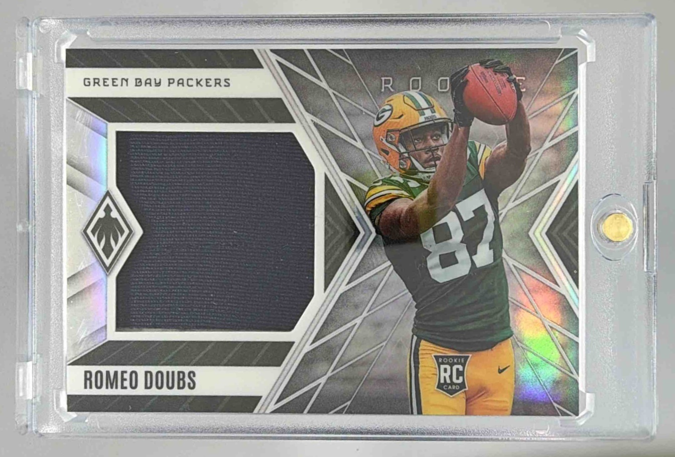 Card image for 2022 Panini Phoenix Romeo Doubs Rookie Jumbo Memorabilia Purple /75 #RJM-34 RC Packers