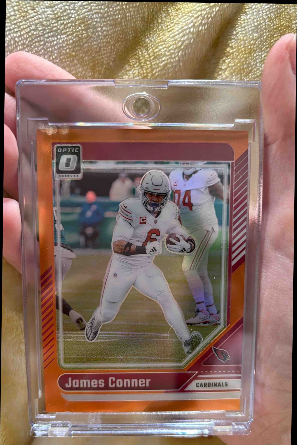 Card image for 2024 Panini Football Prizm James Conner Orange /249 #2 Arizona Cardinals