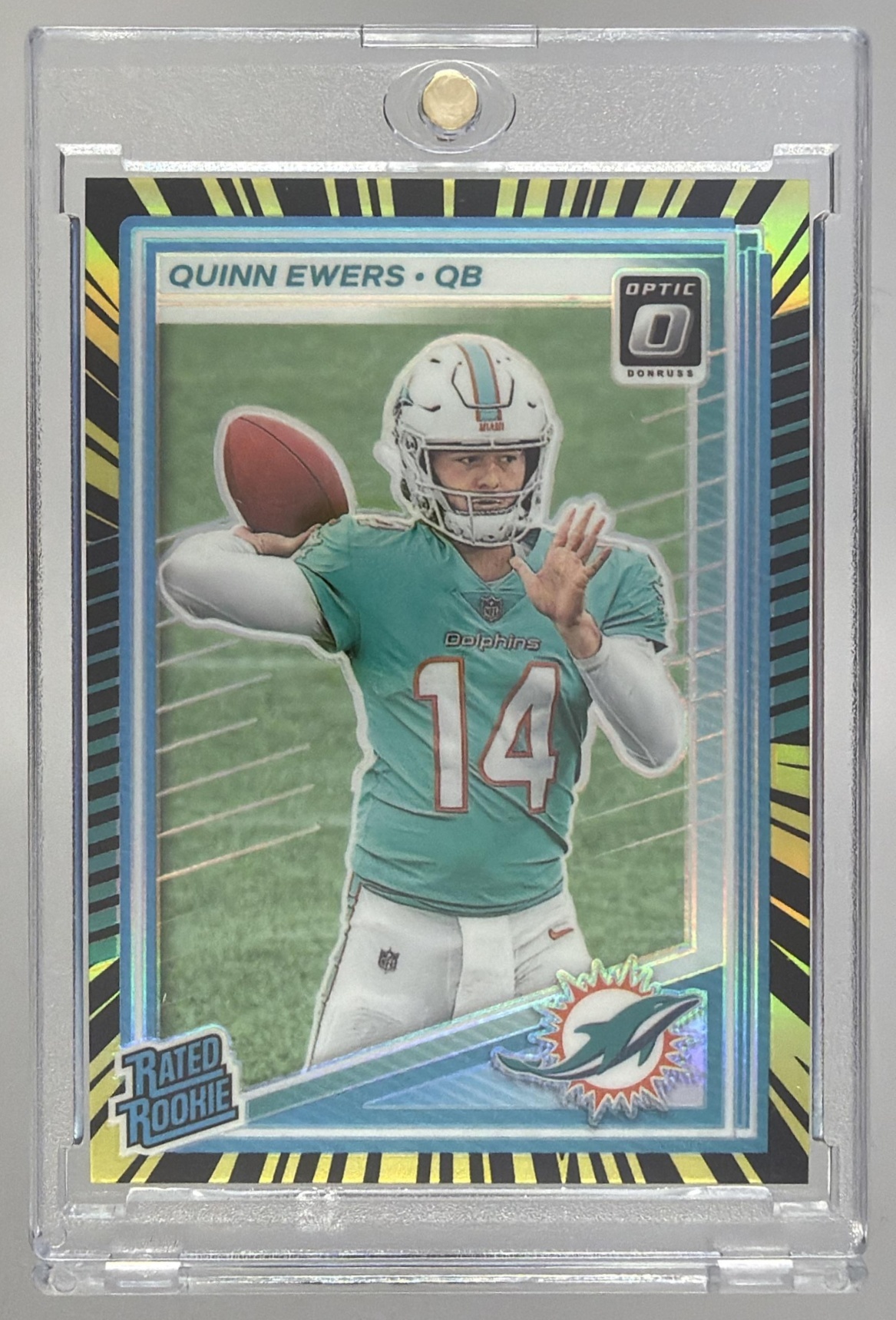 Card image for 2025 Panini Donruss Optic Quinn Ewers Rated Rookie Electricity Prizm /75 #213 Dolphins
