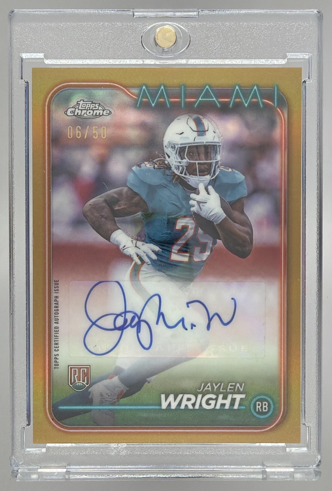 Card image for 2024 Topps Chrome Jaylen Wright Rookie Auto Gold Wave Refractor /50 #RA-JWR RC Dolphins
