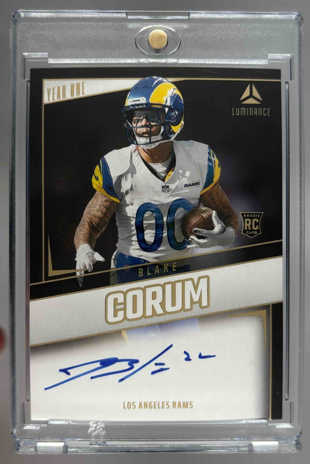 Card image for 2024 Panini Luminance Blake Corum Year One Signatures RPS #YOS-BCM Auto RC Rams