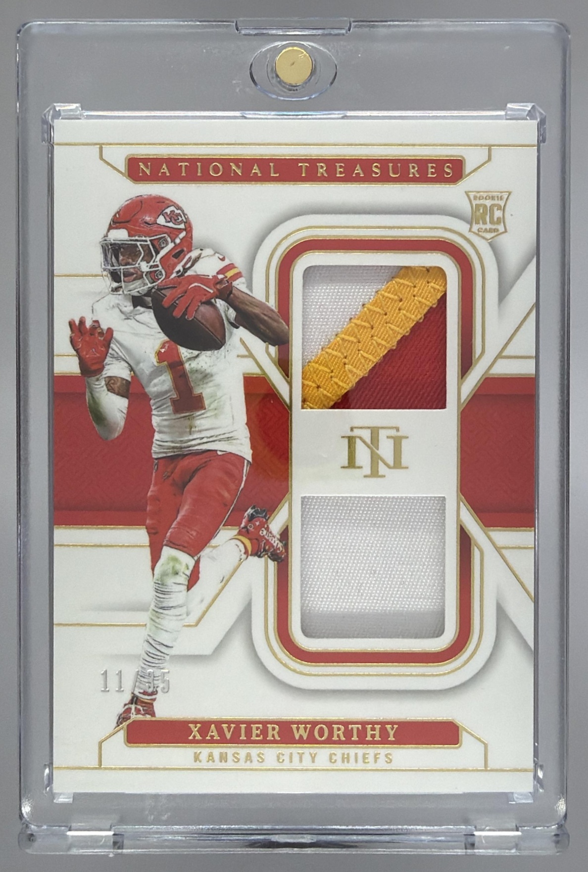 Card image for 2025 Panini National Treasures Xavier Worthy Framed Fabric Holo Gold /10 #FF-XWY Chiefs