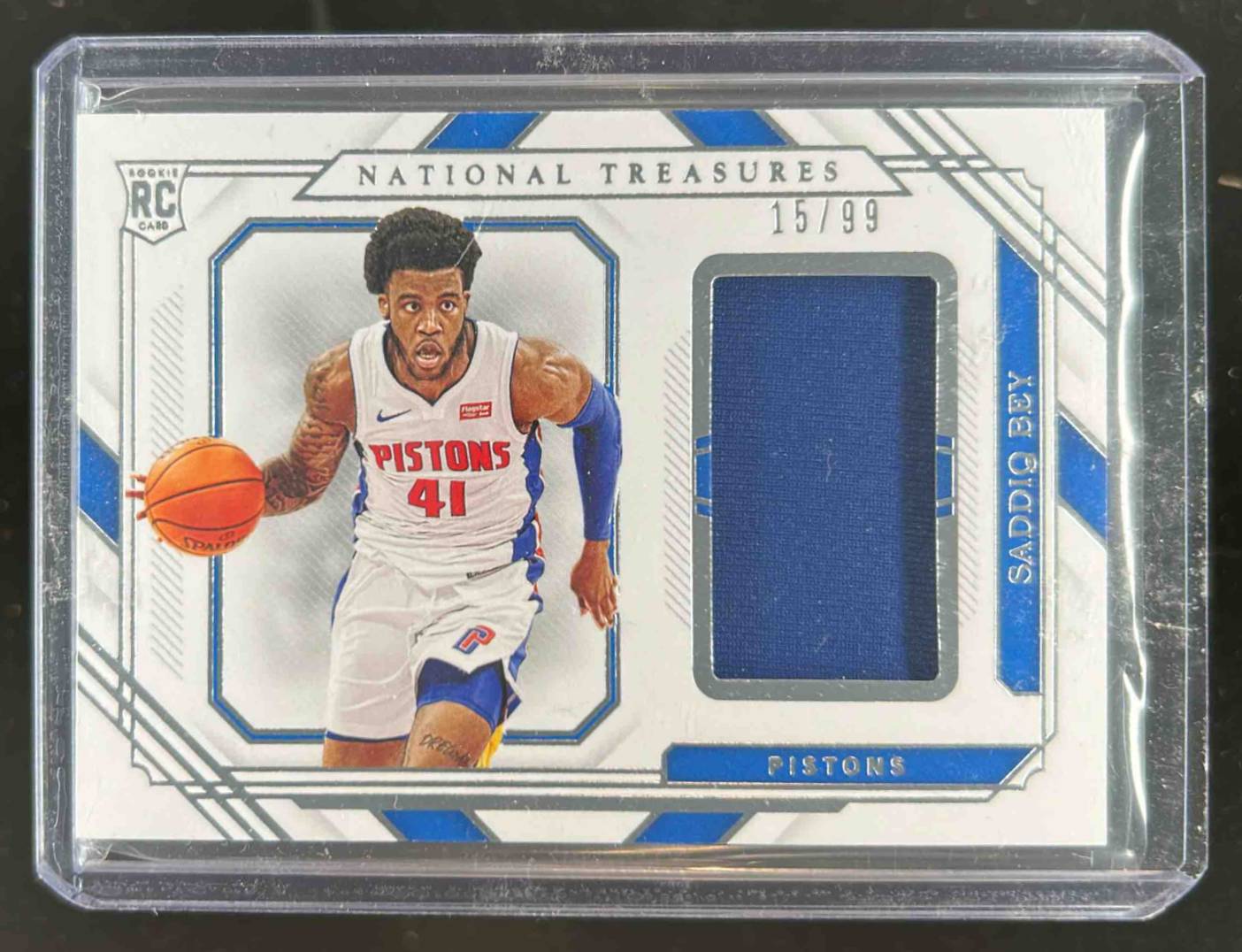 Card image for 2020-21 Panini National Treasures Saddiq Bey Rookie Materials 15 /99 #RM1-SBY MEM RC