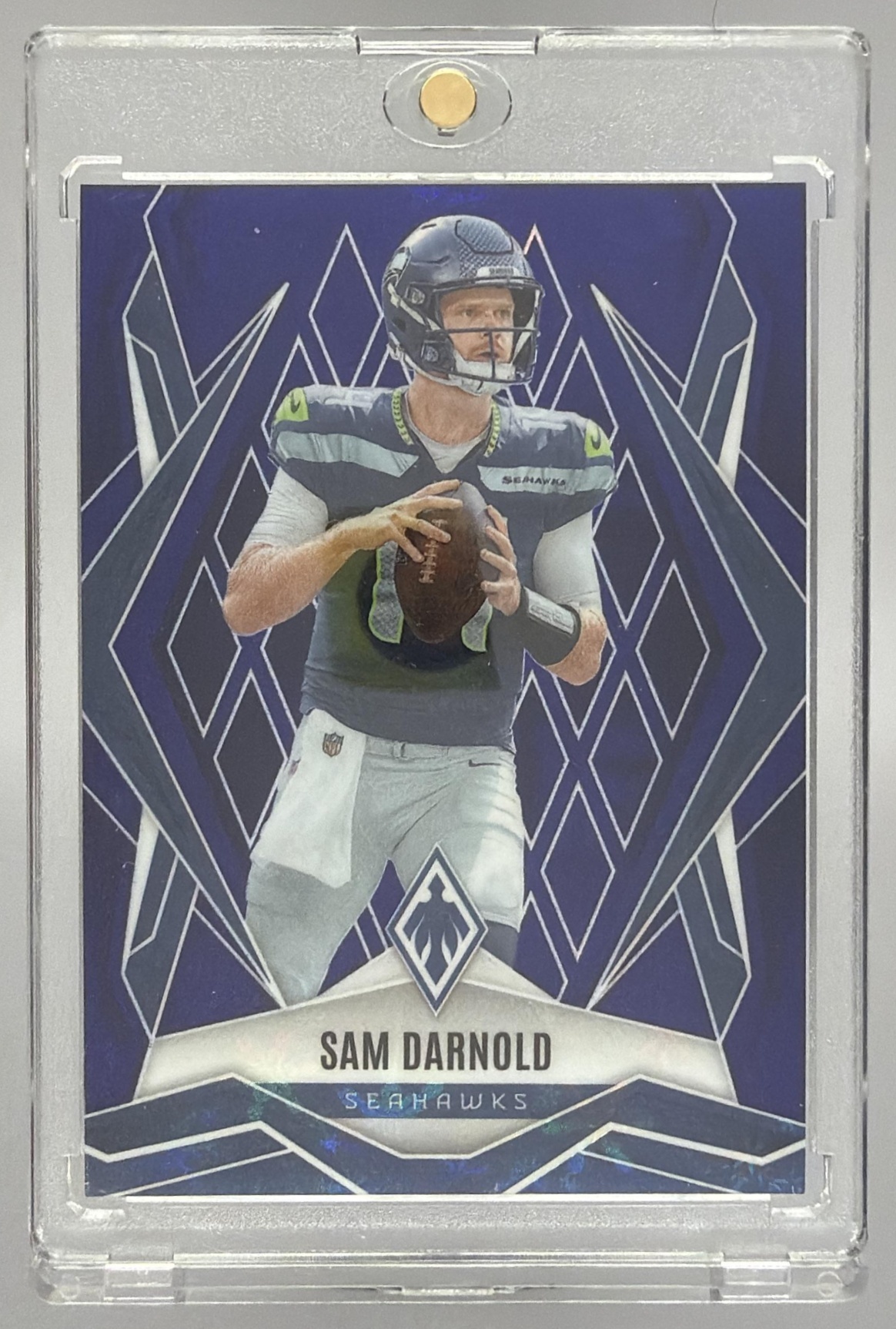 Card image for 2025 Panini Football Phoenix Sam Darnold Wave Prizm /199 #49 Seattle Seahawks