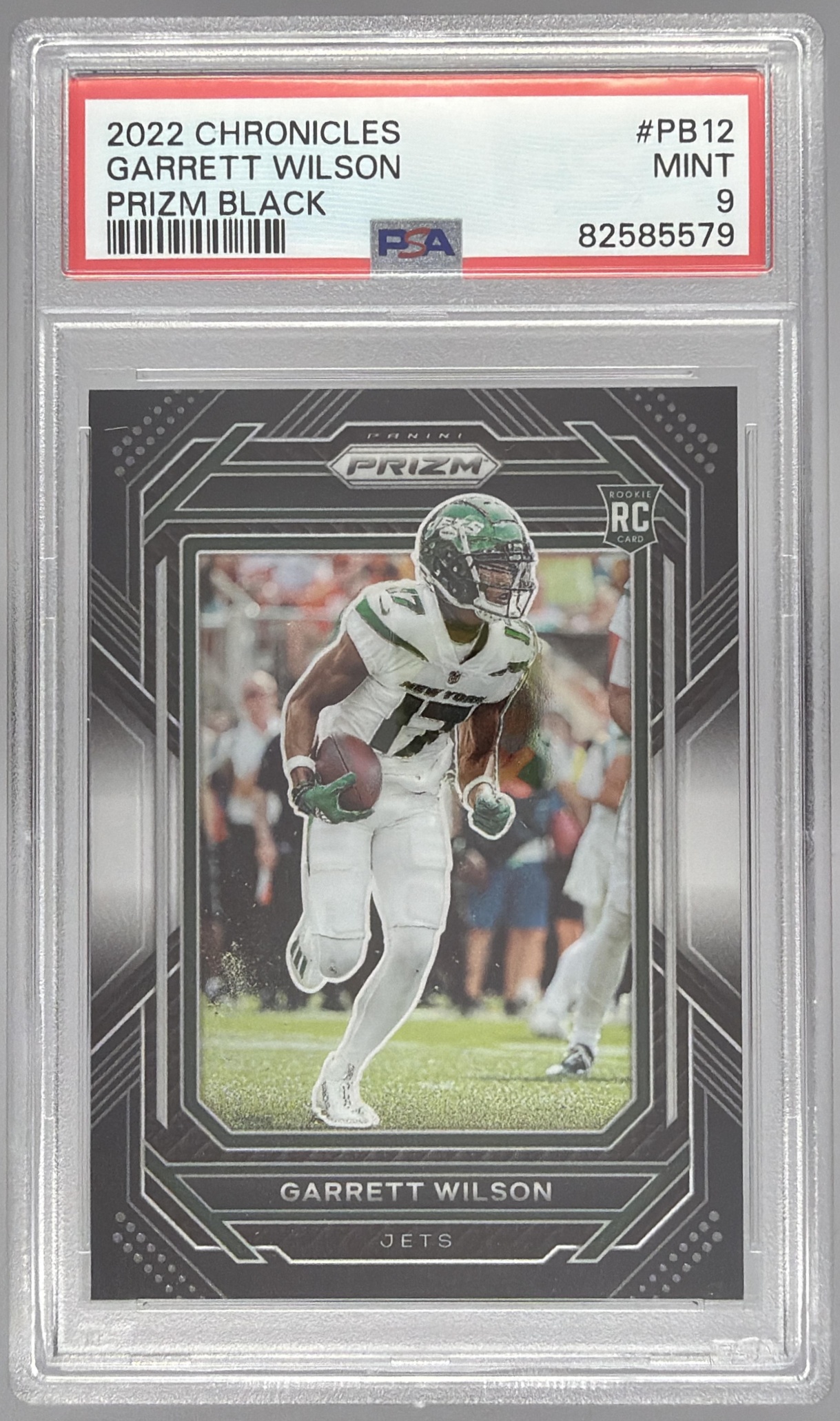 Card image for 2022 Panini Chronicles Garrett Wilson Prizm Black #PB-12 RC Jets