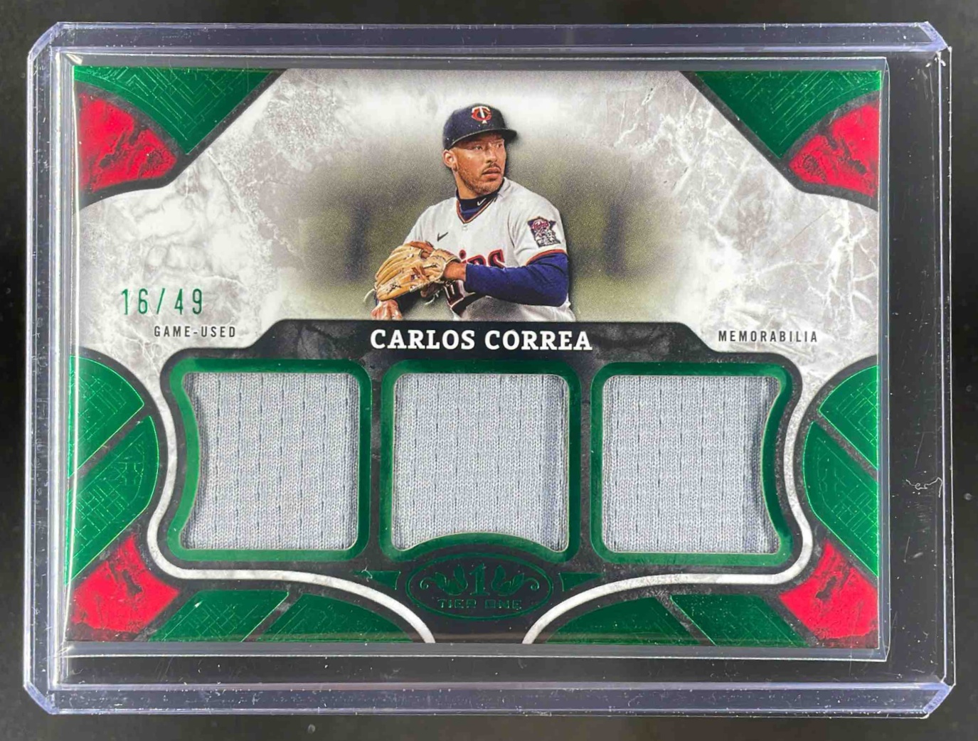 Card image for 2024 Topps Tier One Carlos Correa Relics Triples /49 #T1R-CCO MEM